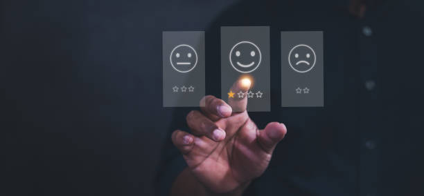 istock Customer service satisfaction survey concept, business people or customers express their satisfaction through applications on the tablet screen. 1413399283