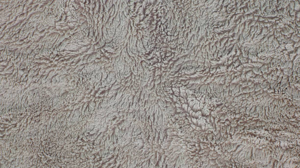 istock cotton fleece fabric beige surface background 1413401784