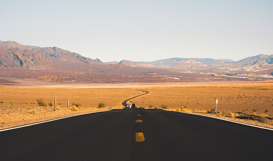 Asphalt road in the desert of Death Valley, California.