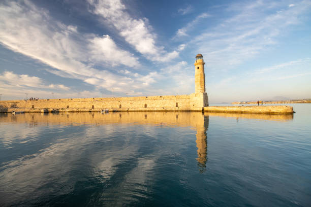 Lighthouse in Rethymno on Crete, Greece. This was built in the 1830s when Egypt occupied Crete, having been given the island by the Turks. In 1864 it was managed by the French Lighthouse Company.
