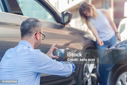 istock Photographing Car After A Traffic Accident 1413407048