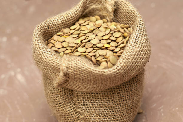 istock lentil grains in a canvas bag on the table 1413407218