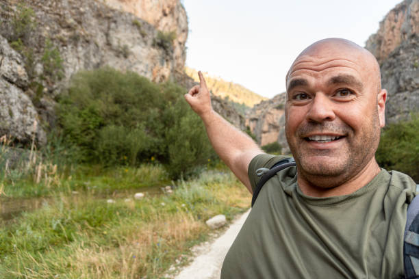 istock male hiker  selfie 1413413785