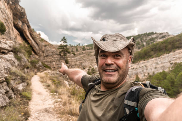istock male hiker  selfie 1413413840