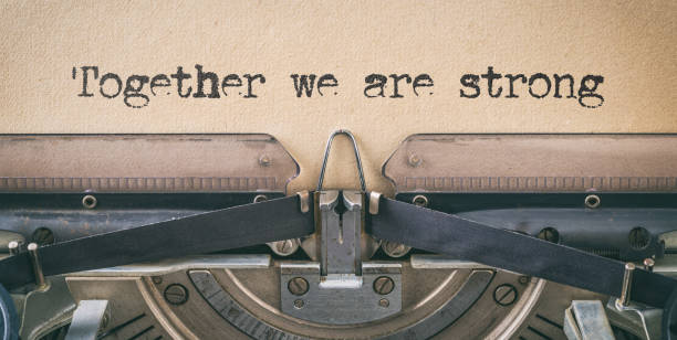istock Text written with a vintage typewriter - Together we are strong 1413418131