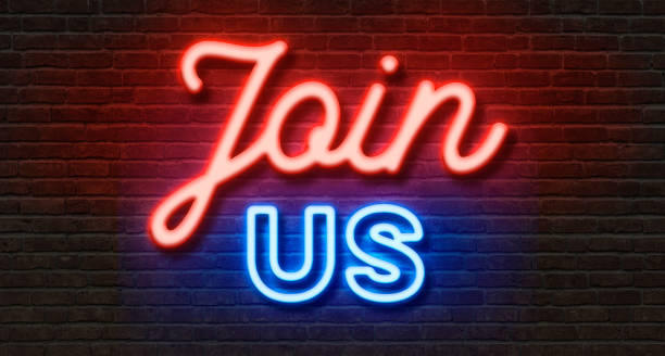 istock Neon sign on a brick wall - Join us 1413418402