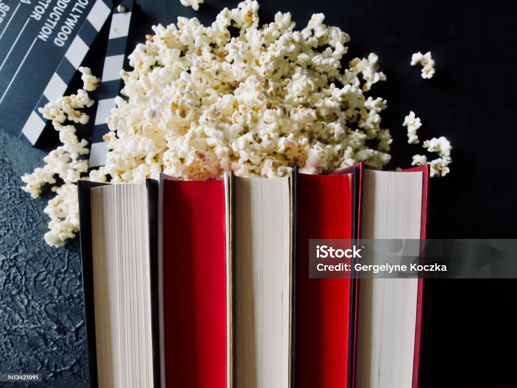 book to movie adaptations book popcorn Movie Stock Photo