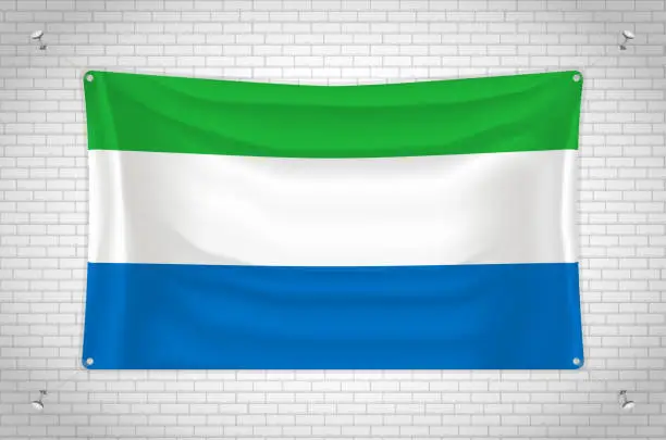 Vector illustration of Sierra Leone flag hanging on brick wall.