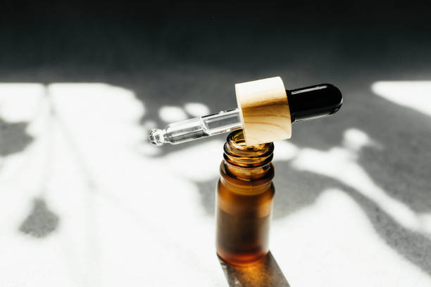 istock Amber bottle with serum or essential oil 1413425978