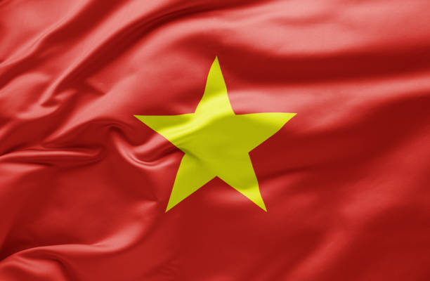Waving national flag of Vietnam stock photo