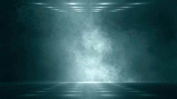 istock The dark stage shows, dark blue background, an empty dark scene, neon light, spotlights The asphalt floor and studio room with smoke float up the interior texture for display products 1413427198