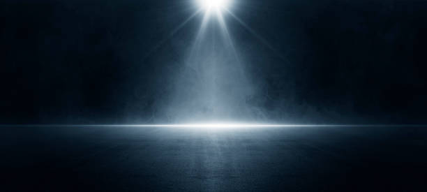 istock A dark empty street, dark blue background, an empty dark scene, neon light, spotlights The asphalt floor and studio room with smoke float up the interior texture. night view 1413427213