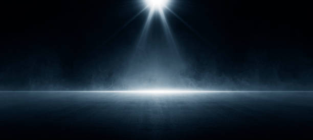 istock A dark empty street, dark blue background, an empty dark scene, neon light, spotlights The asphalt floor and studio room with smoke float up the interior texture. night view 1413427214