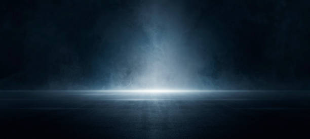 istock A dark empty street, dark blue background, an empty dark scene, neon light, spotlights The asphalt floor and studio room with smoke float up the interior texture. night view 1413427232