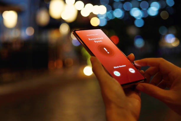 istock Person receiving suspected spam call on smartphone from an unknown caller 1413427394