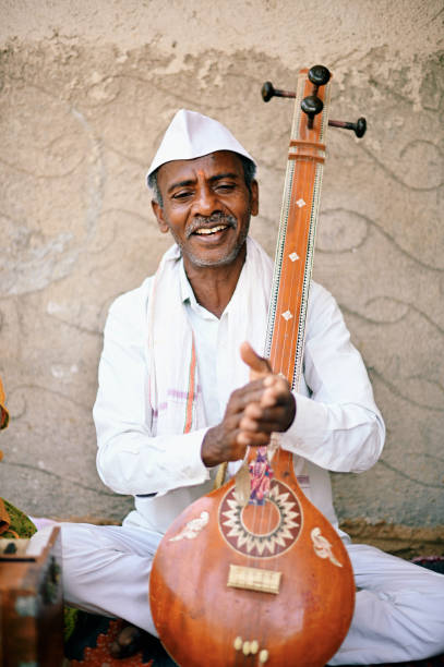 istock A  senior man smiling and clapping his hands 1413428215