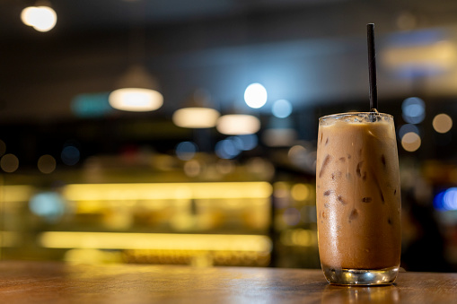 Glass Of Iced Coffee On The Table In A Coffee Shop