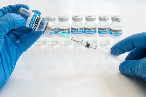 Filling syringe with monkeypox vaccine stock photo