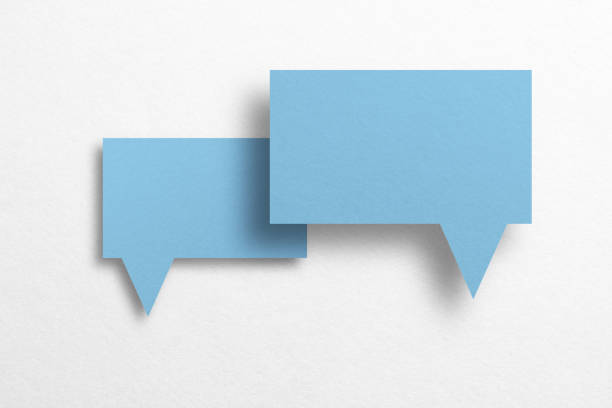 istock Speech balloon shaped blue paper isolated on white background. 1413437187