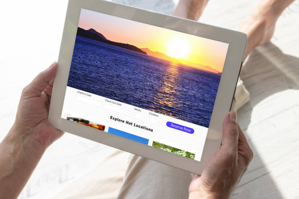 istock Woman using white tablet for booking hotels and browsing destinations online 1413438186