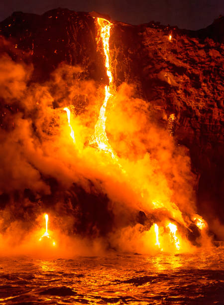 Kilauea Eruption Fire burning on water from lava kīlauea volcano photos stock pictures, royalty-free photos & images