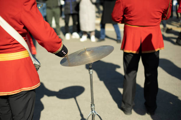 istock Drummer at parade in red clothes. Drumming. 1413438621