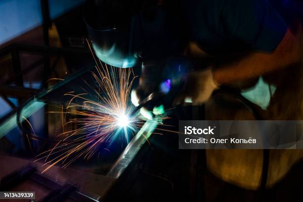 Welding Steel In Workshop Welders Job Production Of Steel Structures Stock Photo - Download Image Now