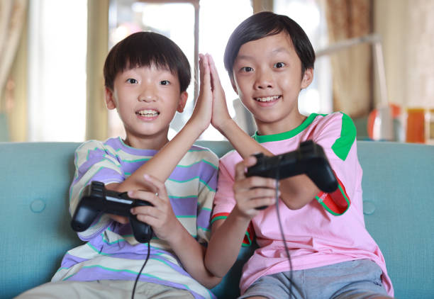 istock Child Playing Video Games 1413439579