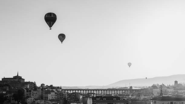 Segovia dreaming Panoramic shot of Segovia during balloon race black and white balloons stock pictures, royalty-free photos & images