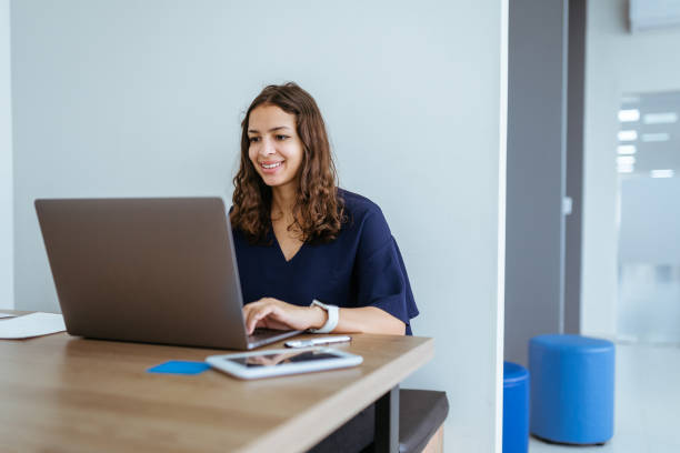 istock Woman working on laptop in the office 1413442499