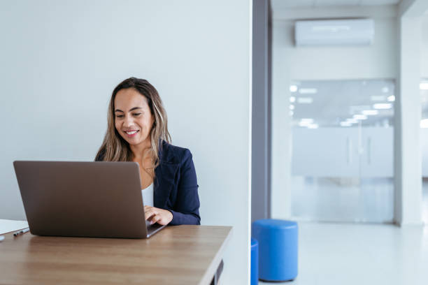 istock Woman working on laptop in the office 1413442502