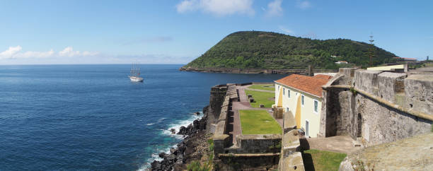 Oceanview from the Fort of Sao Sebastiao, with Mount Brazil in the background, Angra do Heroismo, Terceira Island, Azores, Portugal stock photo