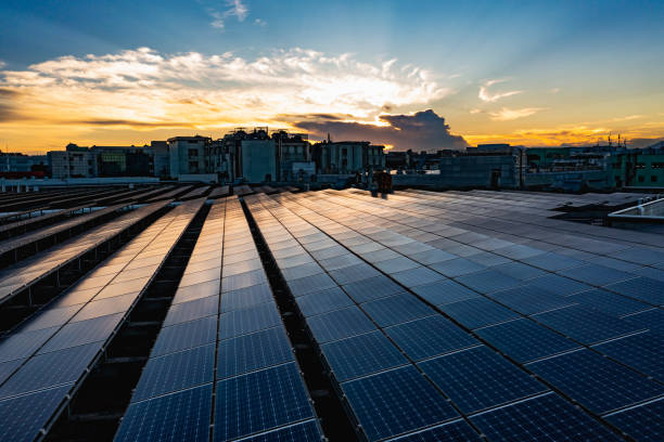 istock Solar panels on the roof at sunset 1413443931
