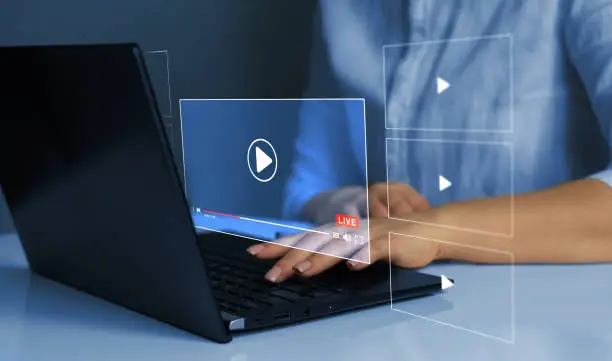 Business person watching a live stream.Online live stream window. Video streaming on internet concept.	 Live digital stream multimedia player