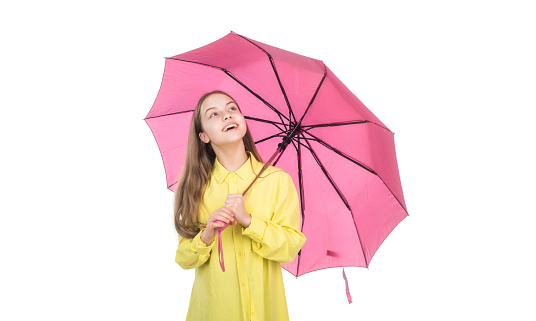 cheerful teen child hold pink parasol. kid in hat with pink umbrella. autumn season. rainy weather forecast. back to school. childhood. fall fashion accessory. happy stylish girl isolated on white.