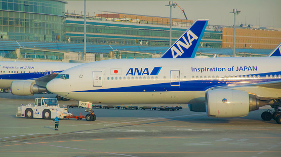 July 22, 2022, Tokyo, Japan, Haneda Airport ANA fleet of planes landed on the runway during a bright morning in Japan.