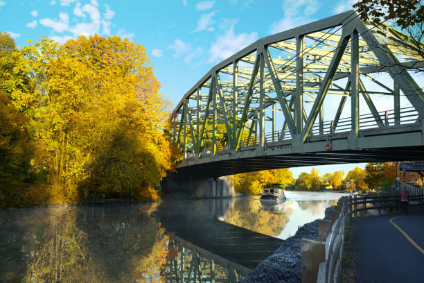 Bridge over the Erie Canal in fall-Pittsford, New York Bridge over the Erie Canal in fall-Pittsford, New York erie canal stock pictures, royalty-free photos & images