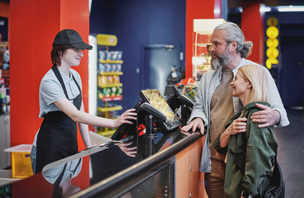 istock Buying Popcorn At Cinema 1413453439