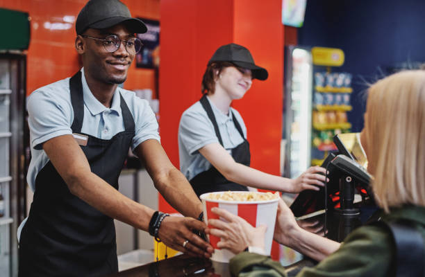 istock Buying Popcorn Before Movie Start 1413453458