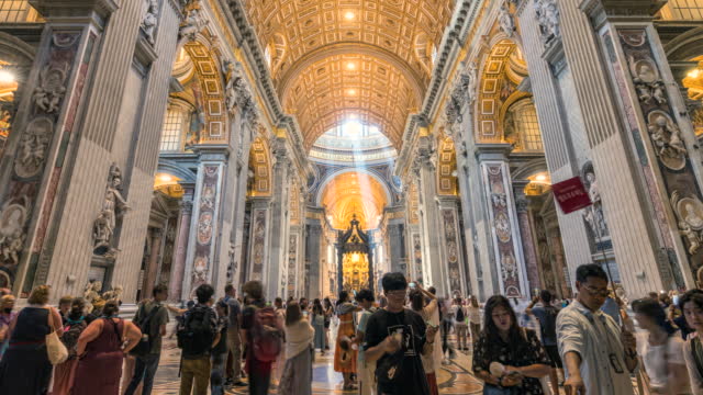 Timelapse crowd of People and Interior decoration of the Cathedral of Basilica di San Pietro in Vatican City, Italy