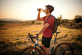 Cyclist taking a rest after long ride