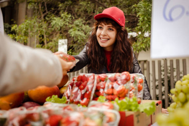Fruit vendor and customer