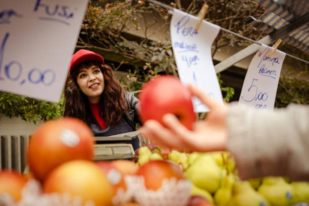 Fruit vendor and customer