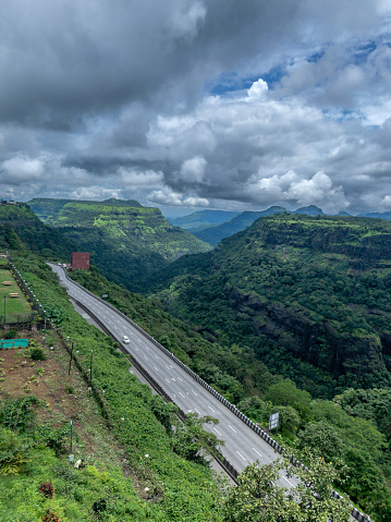 The Mumbai-Pune Expressway during the monsoon season at Khandala near Pune India. The Expressway is officially called the Yashvantrao Chavan Expressway.