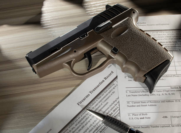 istock semi auto gun with public domain purchase form 1413460188