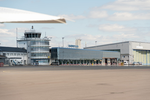 Saarbruecken, Germany, July 10, 2022 Building and parking area at the local airport