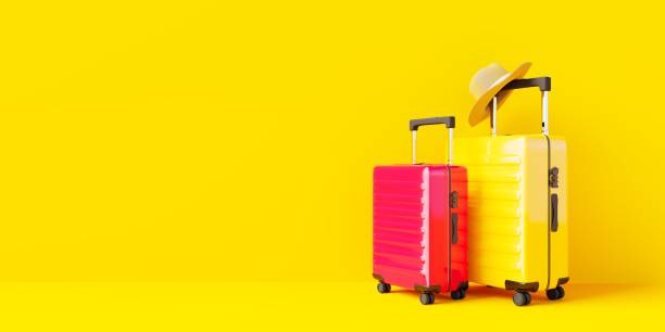 istock Yellow and red suitcases on a yellow background. 3d render 1413466181