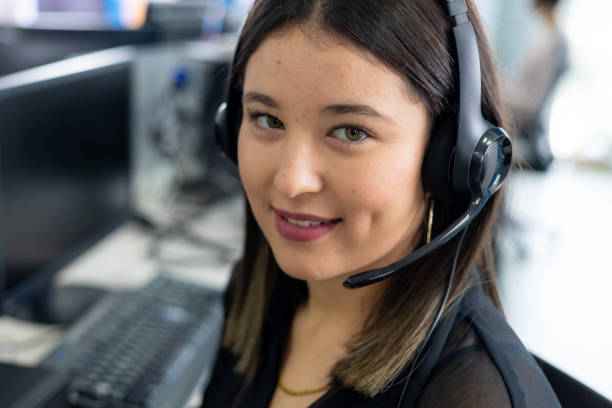 istock Beauty woman working in a callcenter 1413466741