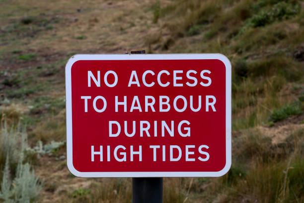 istock No Access to Harbour During High Tides Signboard at a Coastal Location 1413469661