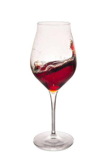 istock glass of red wine with splash 1413472556